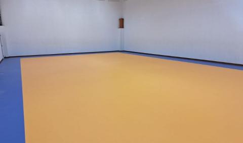 salle de gym bleu et jaune Rixensart