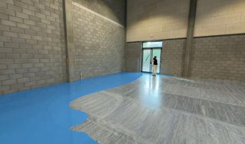 pose d'un sol sportif en polyuréthane